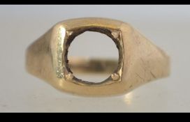 A 9ct gold hallmarked signet ring missing the central agate stone. Total weight 2.