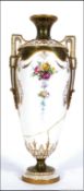 A 19th century Royal Worcester twin handled vase with scrolling gilt decoration having puce