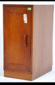 A mid century Industrial teak wood foot locker with full length door, likely ex Air Ministry.