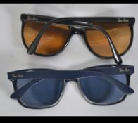 Two pairs of original Ray Ban sun glasses, the first pair having mirrored lenses. Please see images.