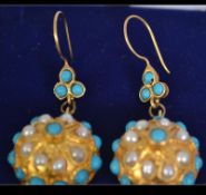 A pair of turquoise and cultured pearl 19th century earrings set upon a gilt metal background