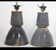 A pair of mid century - 1960's industrial factory pendant lights.