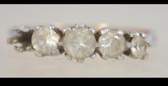 9ct gold ring set with clear stones one stone missing. Hallmarked Birmingham. Size N.5.