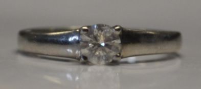 A 950 palladium solitaire diamond ring approx 35pts. Hallmarked 950. Size K.5.