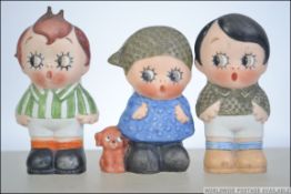 An early 20th century group of 3 Schafer & Vater Figural bisqueware match holders to include