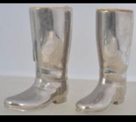 A pair of 20th century silver plated boot measures - liquer measures with plastic inserts.