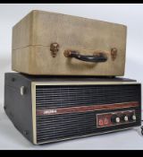 A 1950's Bush BSR vintage record player together with a Philips cased record player