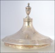 A silver hallmarked trophy lid. The silver hallmarks for Robert Pringle & Sons, London, 1931.