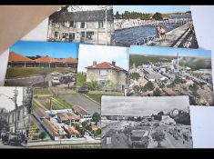 Several hundred postcards in box.