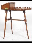 A 19th century fine mahogany butlers assistant table raised on faux bamboo supports having a