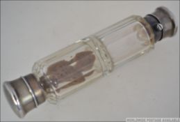 A Victorian double ended crystal glass & Silver ladies perfume & Vinaigerette phial bottle.