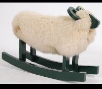 A stunning 20th century childs rocker in the form of a Ram.
