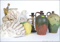 A collection of ceramics to include a large wall pocket of oyster form a carp,
