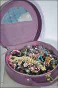 A collection of costume jewellery to include necklaces bracelets etc.