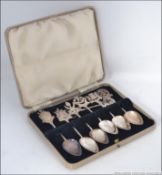 A collection of seven silver early 20th century teaspoons.