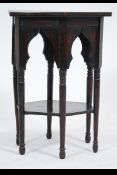 A believed early 20th century Liberty of London Arts Crafts Moorish oak hexagonal occasional side