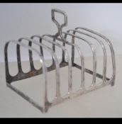 A silver hallmarked six slice toast rack with Birmingham assay marks,