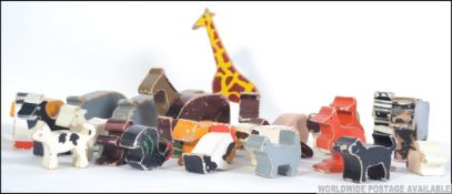 A collection of mid century painted wooden animal - Noah's ark toy wooden creatures to include