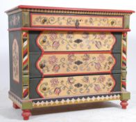 A 19th century continental German painted pine chest of drawers.