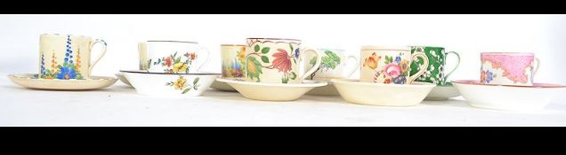 A set of 9 coffee cans and saucers of various makers to include Royal Cauldon, Bristol,