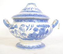 A 19th century blue and white twin handled bombe urn soup tureen of large form having underglaze