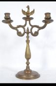 An unusual brass polish 3 sconce candelabra with removeable central sconce that allows for the