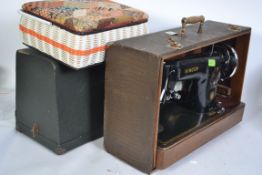 2 Cased sewing machines . SINGER and BRITISH FEDERATION .