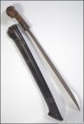 A 19th century ox horn handled machete type fighting sword.