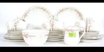 An early 20th century Heathcote china ' tyne ' pattern part tea service comprising cups, saucers,