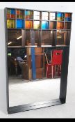 A Large Scottish box framed mirror in the manner of Charles Rennie Mackintosh .