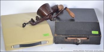 An early 20th century Remington portable typewriter complete in the case together with a retro
