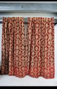 A pair of vintage 20th century French full length velvet lined curtains.