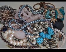 A ladies 14ct clasp gold baroque pearl necklace with pink roundel spacers,