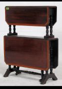 An Edwardian rosewood and line inlaid two tiered Sutherland table - dumb waiter.