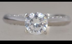 A silver large claw mounted round cut cz adorned ladies engagement ring. Size R.5 / Weight 3.