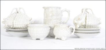 A 1930's Art Deco lustre cornucopia shaped tea service comprising cups,saucers, plates etc.