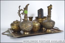 A collection of brass wares from the 20th century to include Lipton tea Caddy,