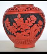 A 20th century enamel and brass Chinese pot decorated to the outside with a heavily decorated