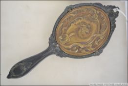 A 19th century brass and white metal ladies dressing mirror,