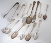 A collection of silver hallmarked flatware to include Georgian 18th century teaspoons by believed
