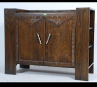 An early 20th century very practical scratch built oak sideboard built by the vendors uncle in the