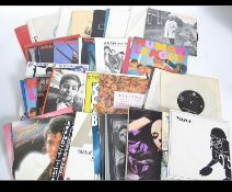A collection of 45rpm vinyl singles to include Soft Cell, Ultravox, Simple Minds, The Smiths,