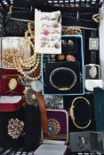 A good collection of vintage and contemporary costume jewellery to include brooches, necklaces,