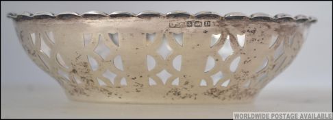 A silver hallmarked fret pierced bon bon dish of oval construction.