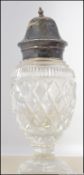 A pretty cut glass crystal sugar shaker.