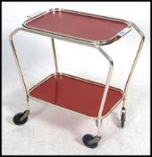 A Art Deco style mid century two-tier tea trolley.