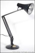 A vintage Herbert Terry post war anglepoise desk lamp in original black paint.