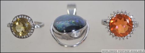 Two silver ( 925 ) rings. The first size P with a large Padparadscha colour 5.