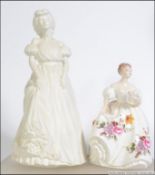 A Royal Doulton figurine entitled Marilyn HN3002 modelled by Peter A Gee along with a Royal