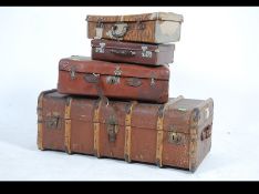 Mixed lot of varying sized retro vintage mid 20th century trunks along with 1 other containing a